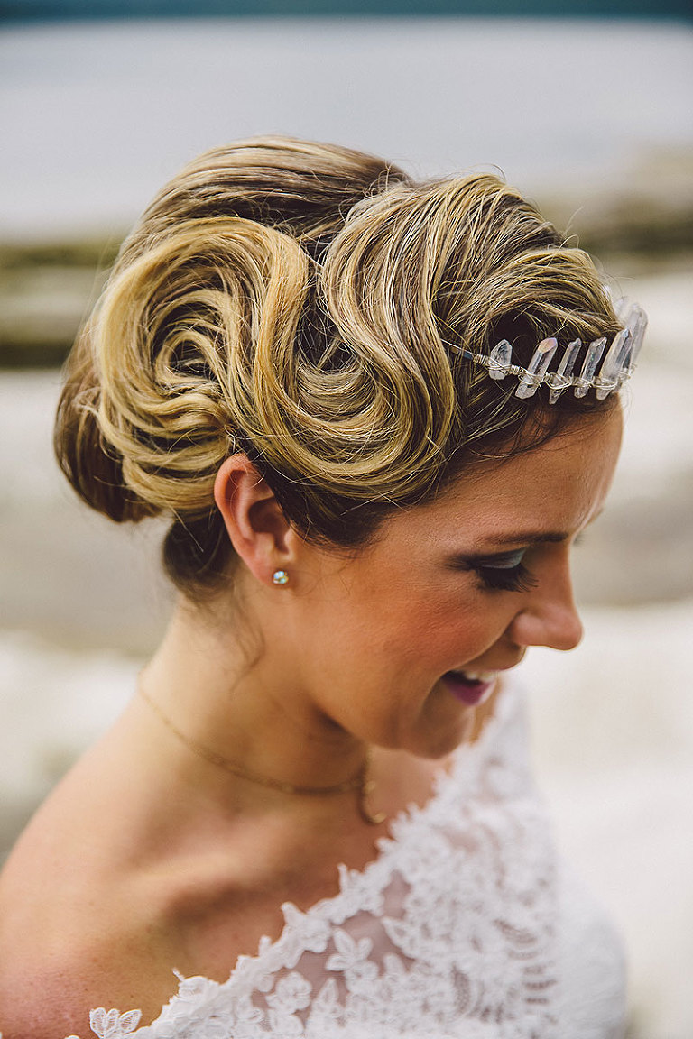 Bridal hairstyle design with exaggerated pin curls for a beachy look. Wedding styling by Party Mood.