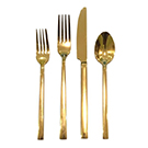 Four-piece gold cutlery table setting wedding decor rental